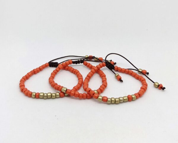 Trío Pulseras Naranja/Dorado